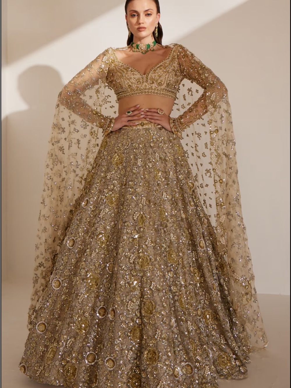 Ruchika Hurria Embellished Gold Bridal Lehenga with Cape